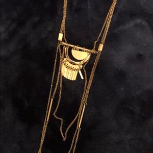 Beautiful long vintage looking necklace.